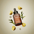 Sérum Vitamina C 20% con dropper sobre limón